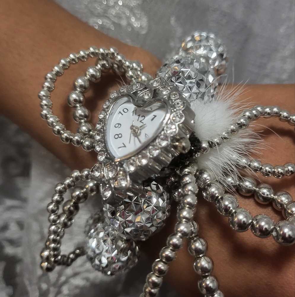 Silver Heart Charm Bracelet with watch.